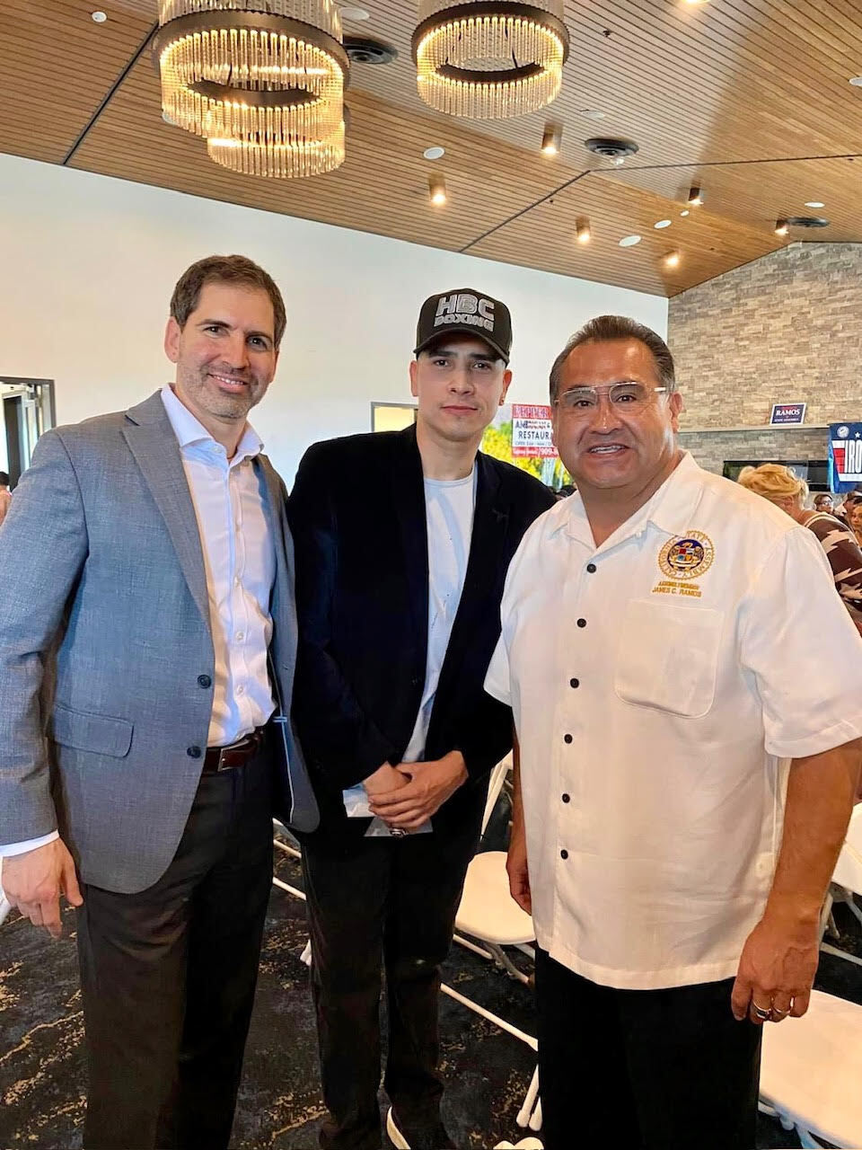 Tony Collins Cifuentes with Assemblyman James Ramos and another community leader
