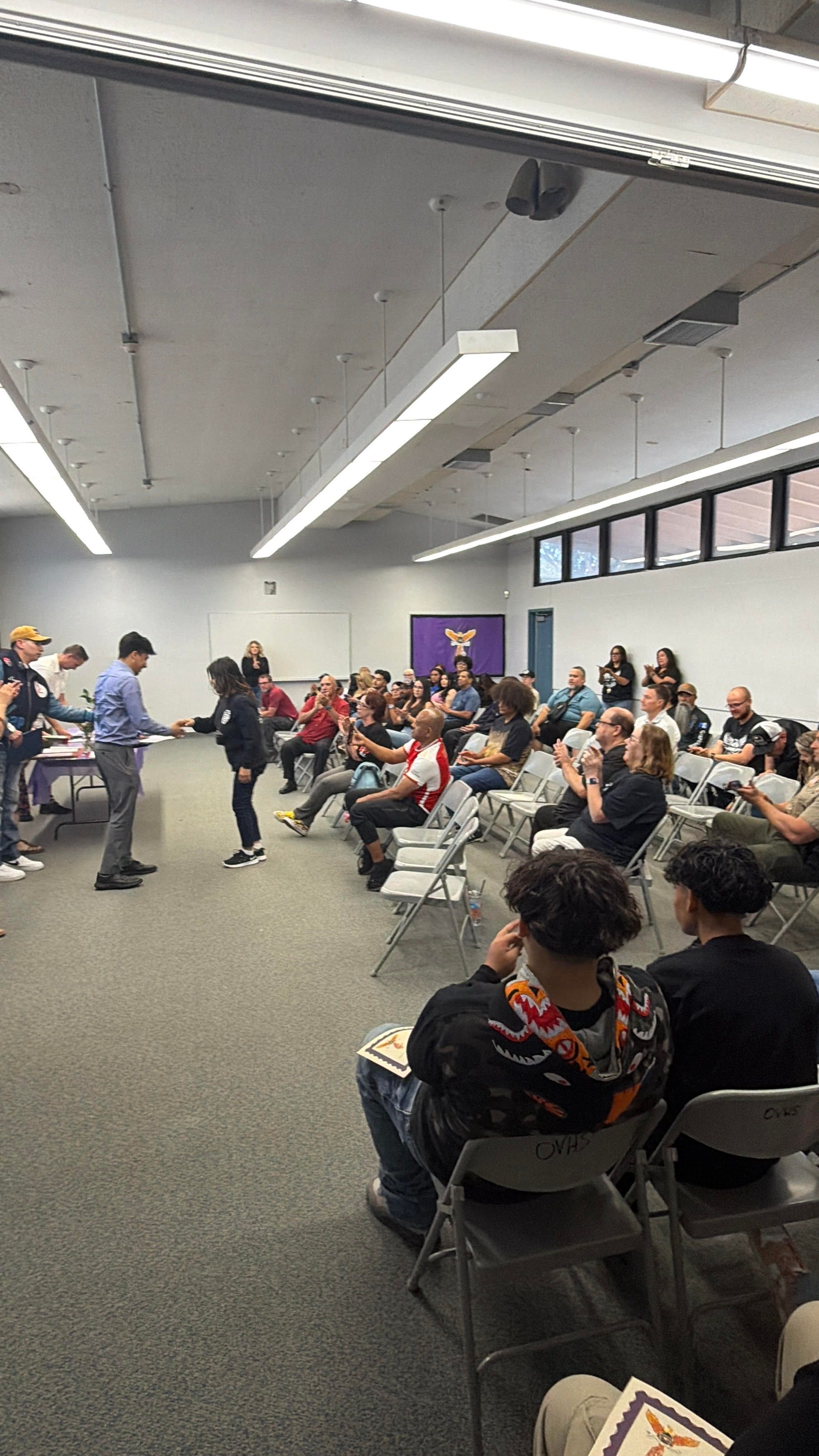 Award ceremony at Oak View High School for the HBC Yucaipa program — families, community leaders, and youth
