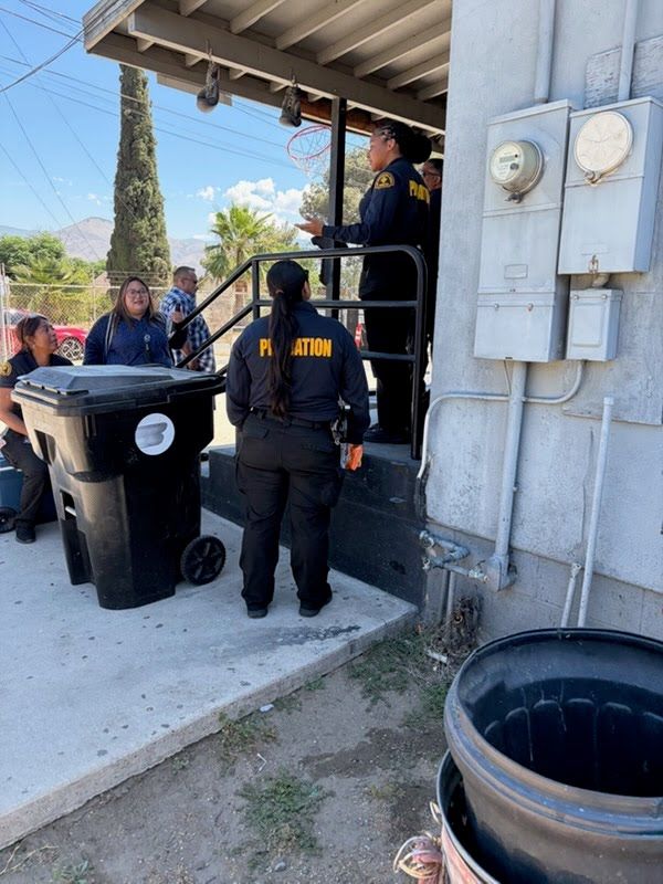 San Bernardino County Probation Department officers mentoring alongside HBC at the summer camp