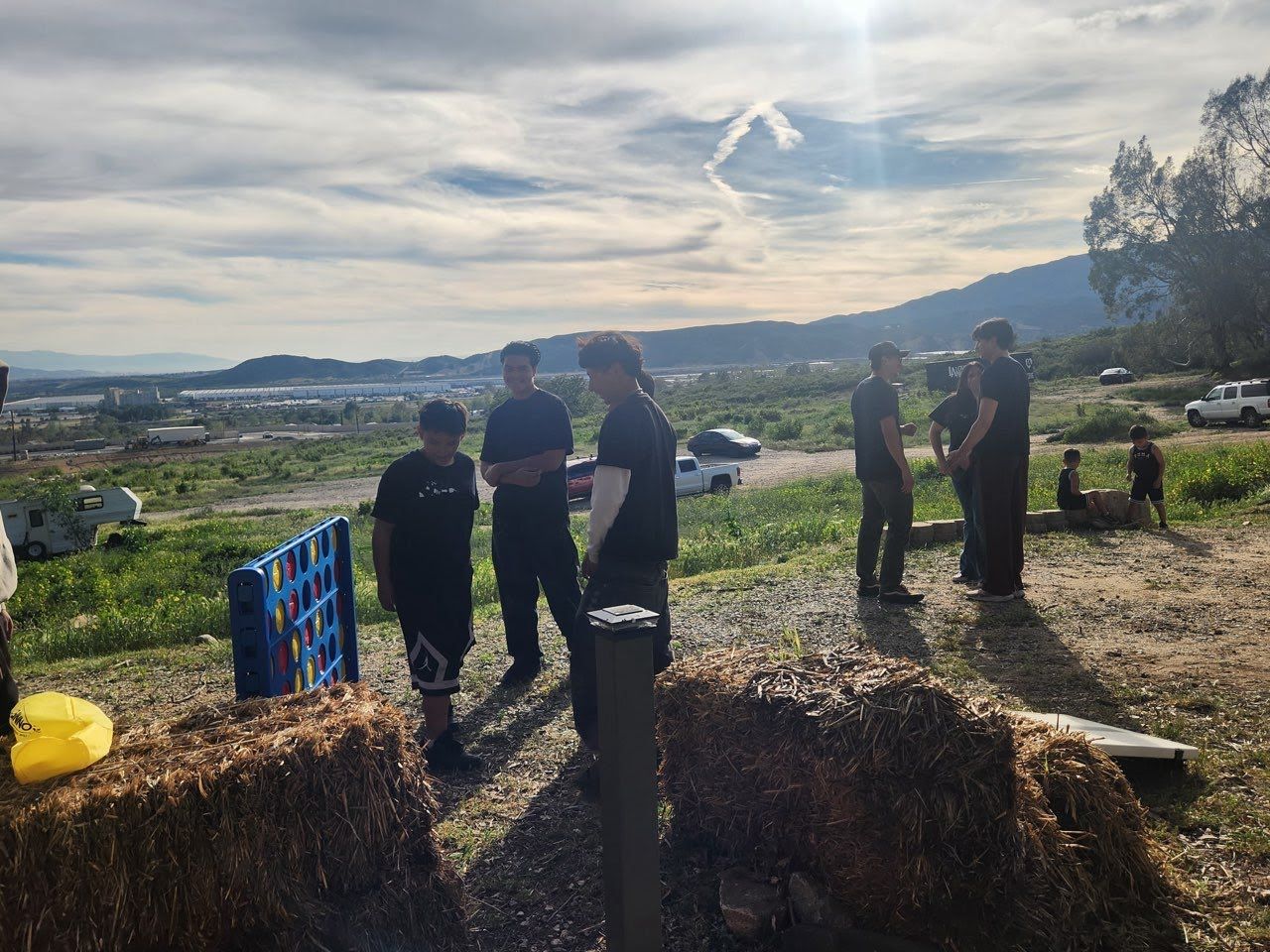 Youth participating in outdoor team challenge