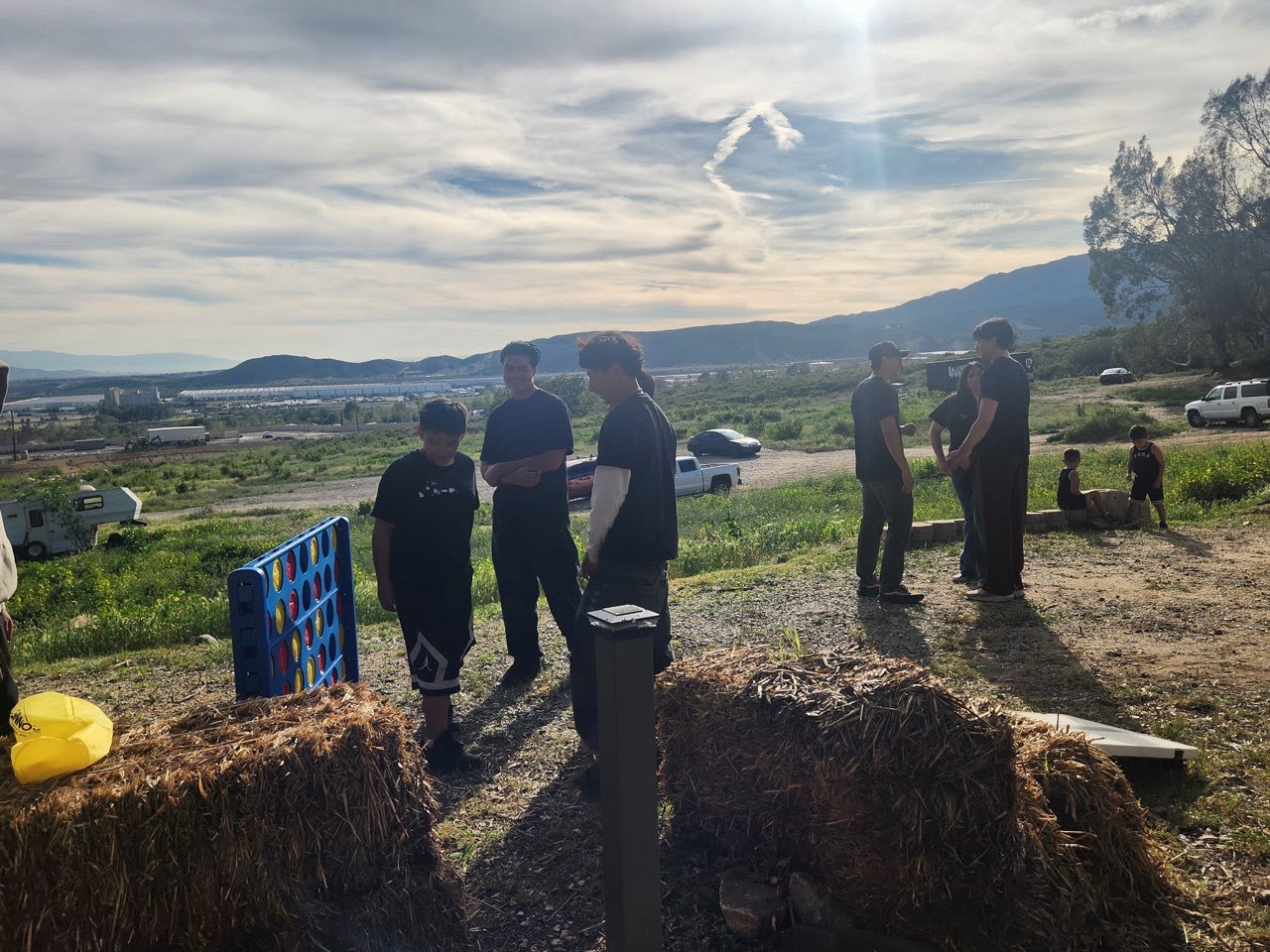 Youth participating in outdoor team challenge