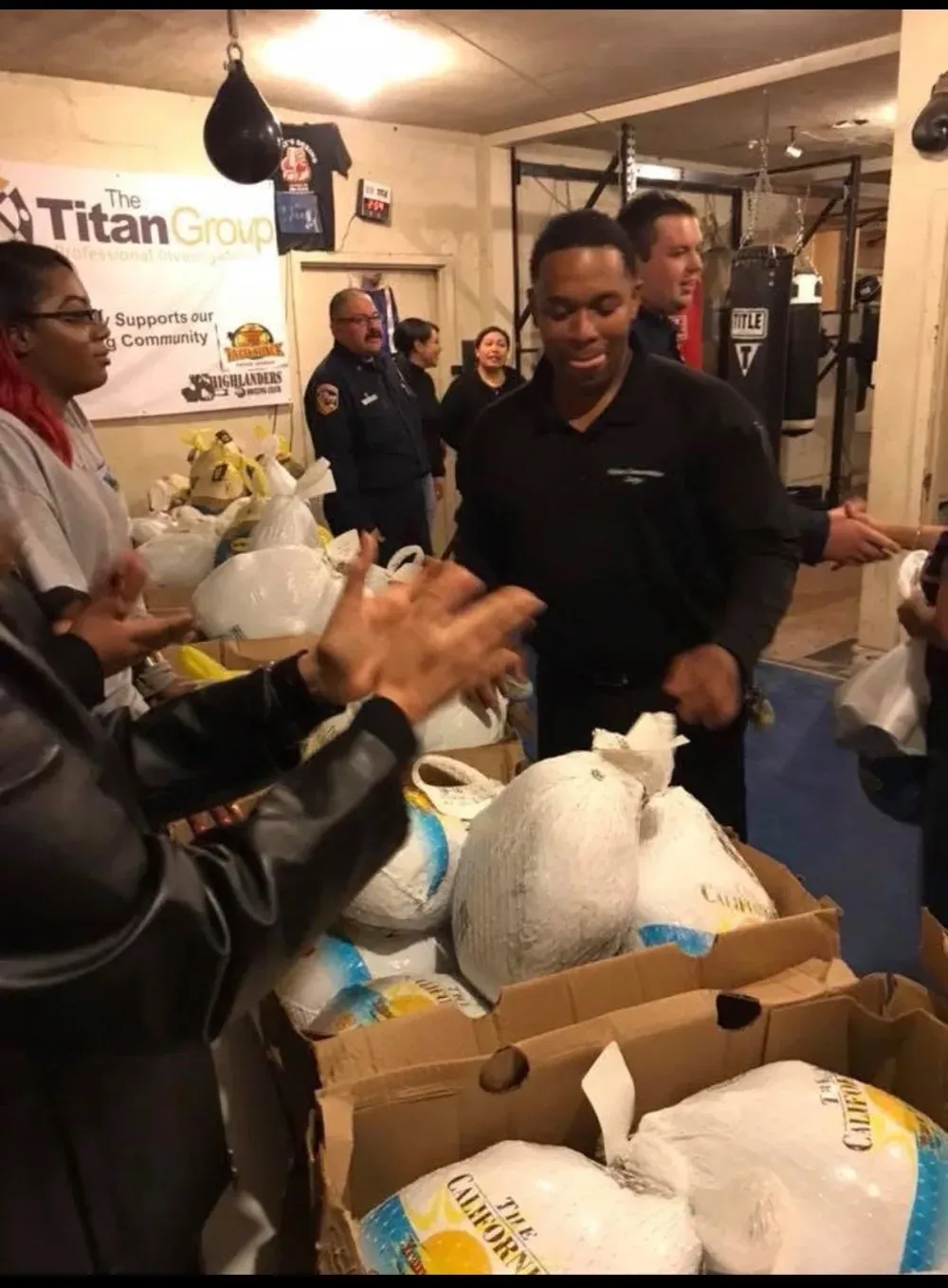 Highlanders Boxing Club Thanksgiving turkey drive distribution to families and community partners