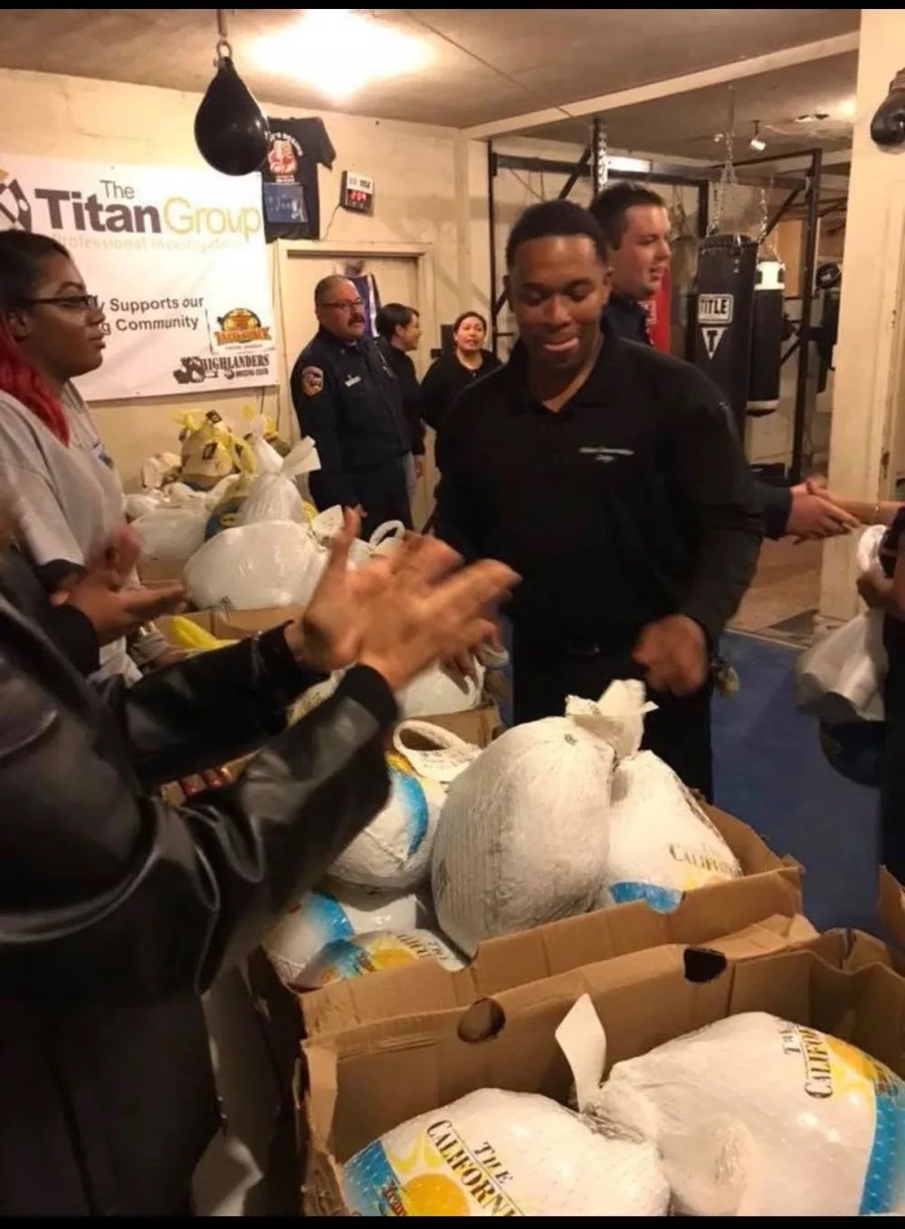 Highlanders Boxing Club Thanksgiving turkey drive distribution to families and community partners